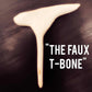 White faux T-bone made from wood for plant-based meat alternatives